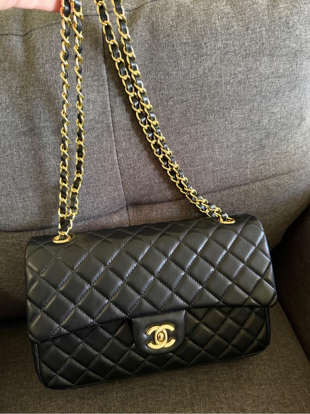 CHANEL Black Quilted Shoulder Bag with Gold Chain
with dust bag. No Box